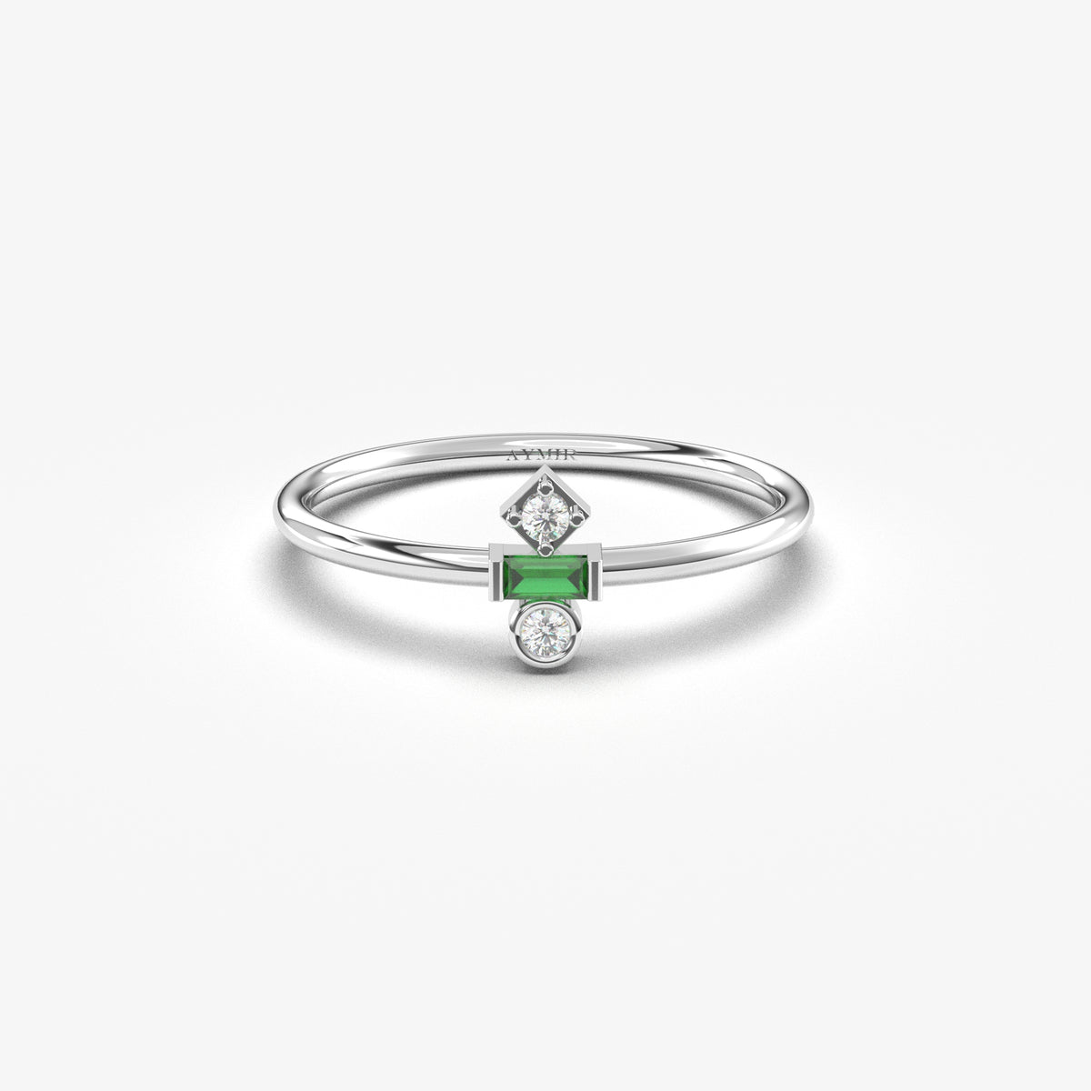 White gold green-stone baguette ring, front view