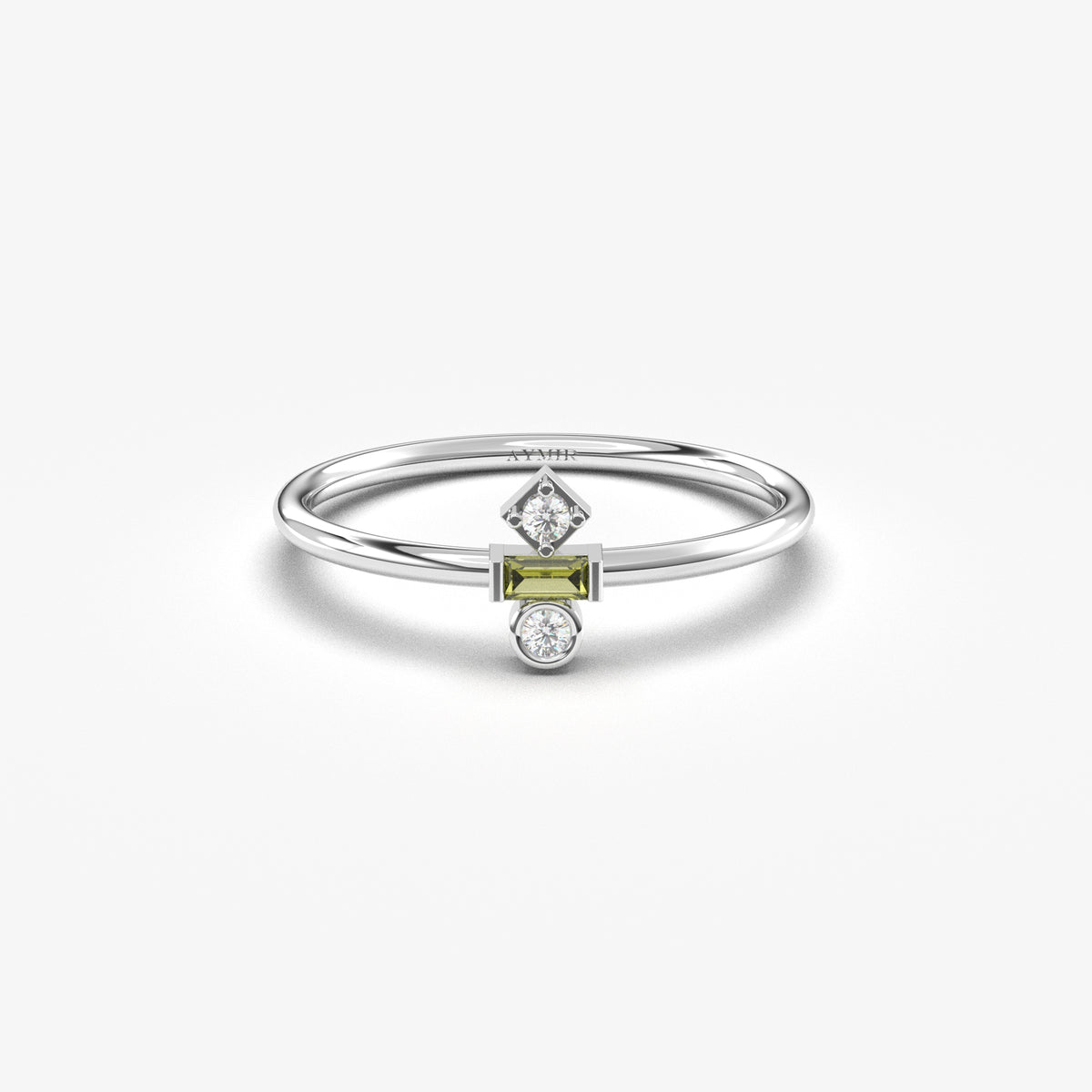 White gold green-stone baguette ring, front view