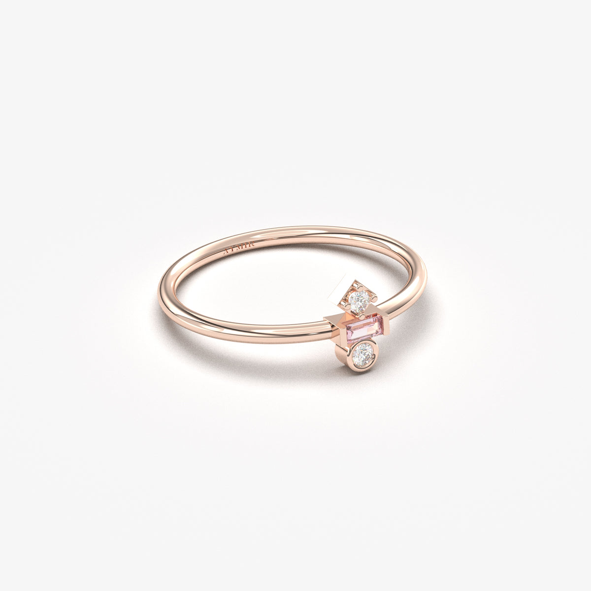 Rose gold pink-stone baguette ring, angled view
