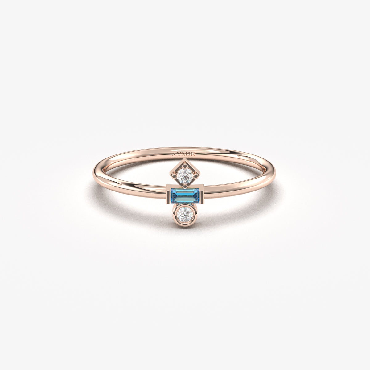Rose gold light-blue-stone baguette ring, front view