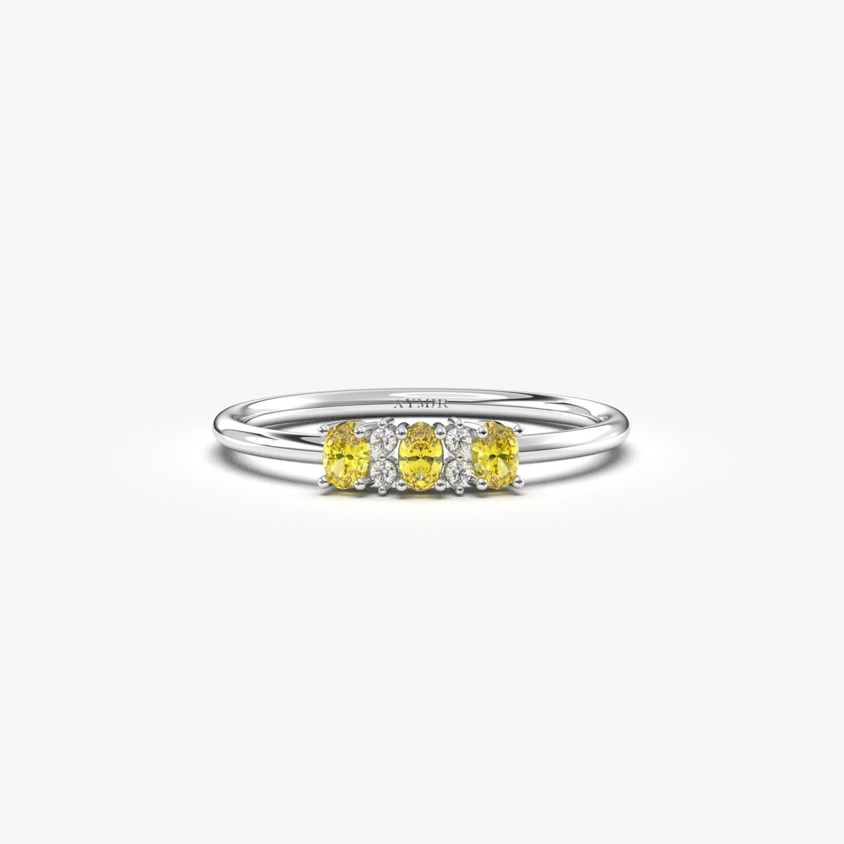 White gold yellow-stone three oval ring, front view