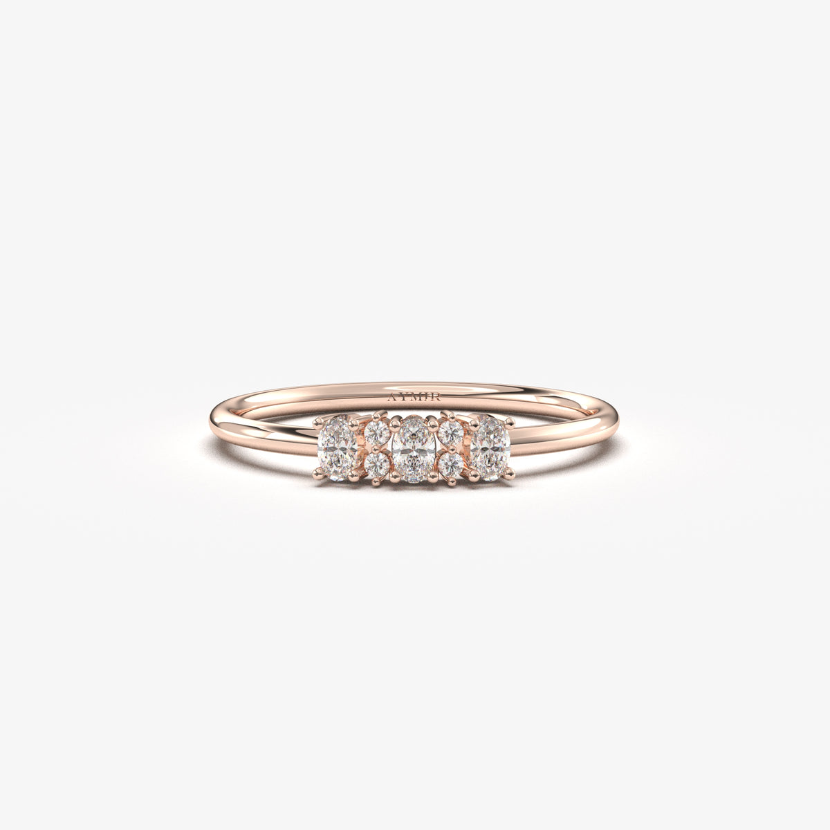 Rose gold three-oval ring, front view