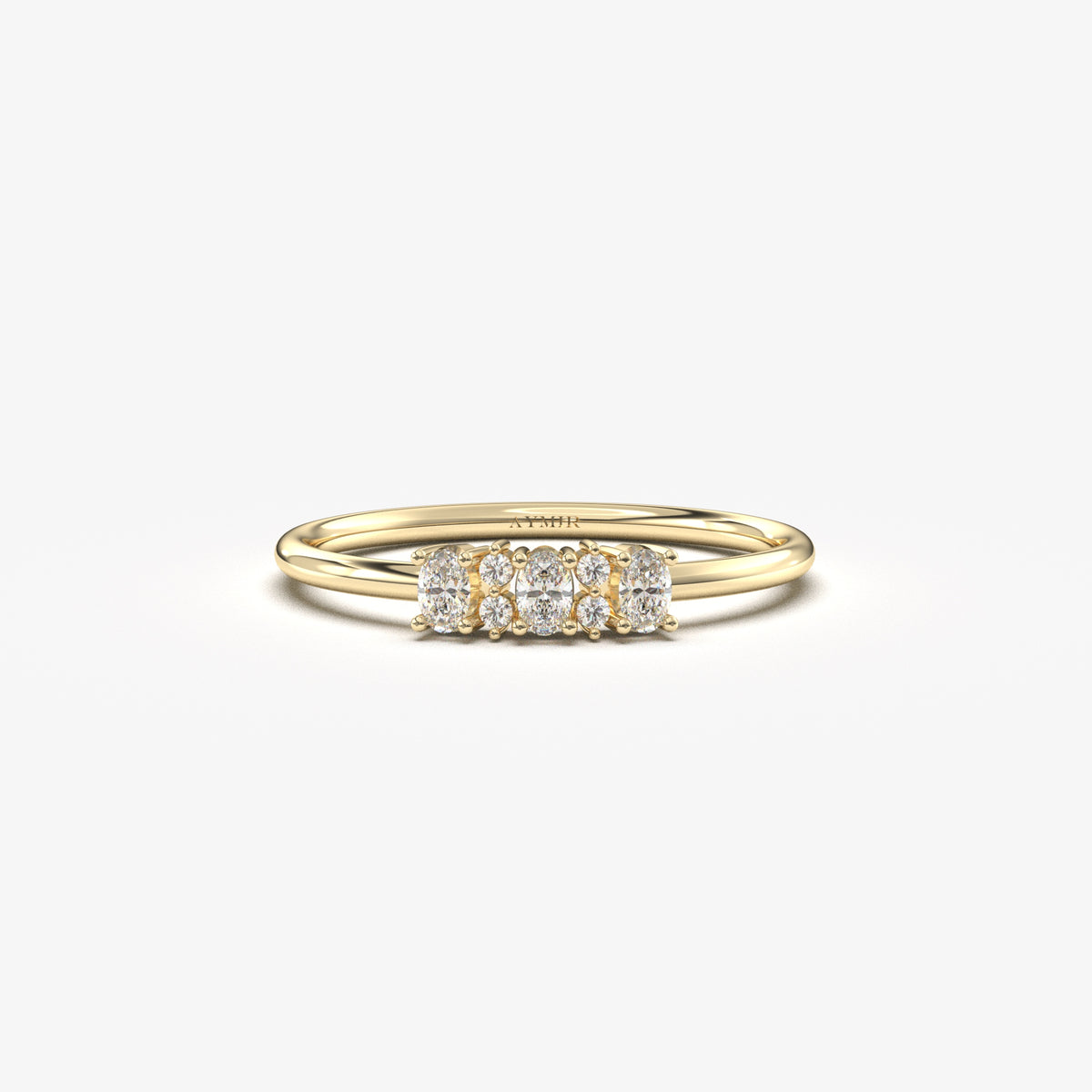 Yellow gold three-oval ring, front view