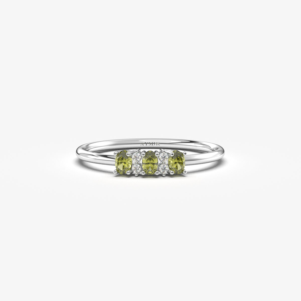 White gold green-stone three oval ring, front view