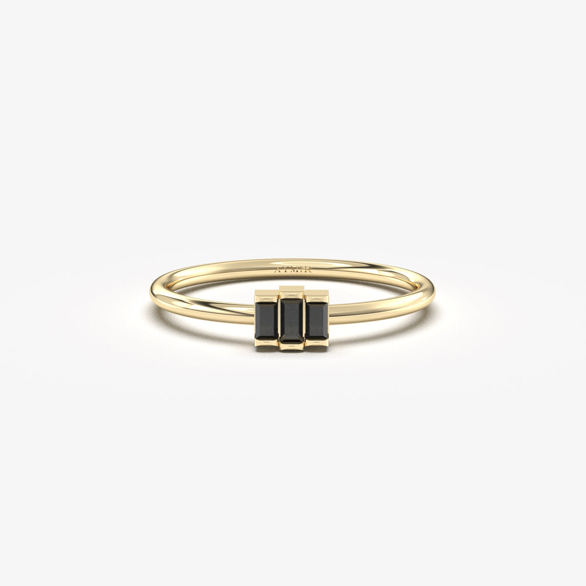 Yellow gold black onyx three-baguette ring, front view