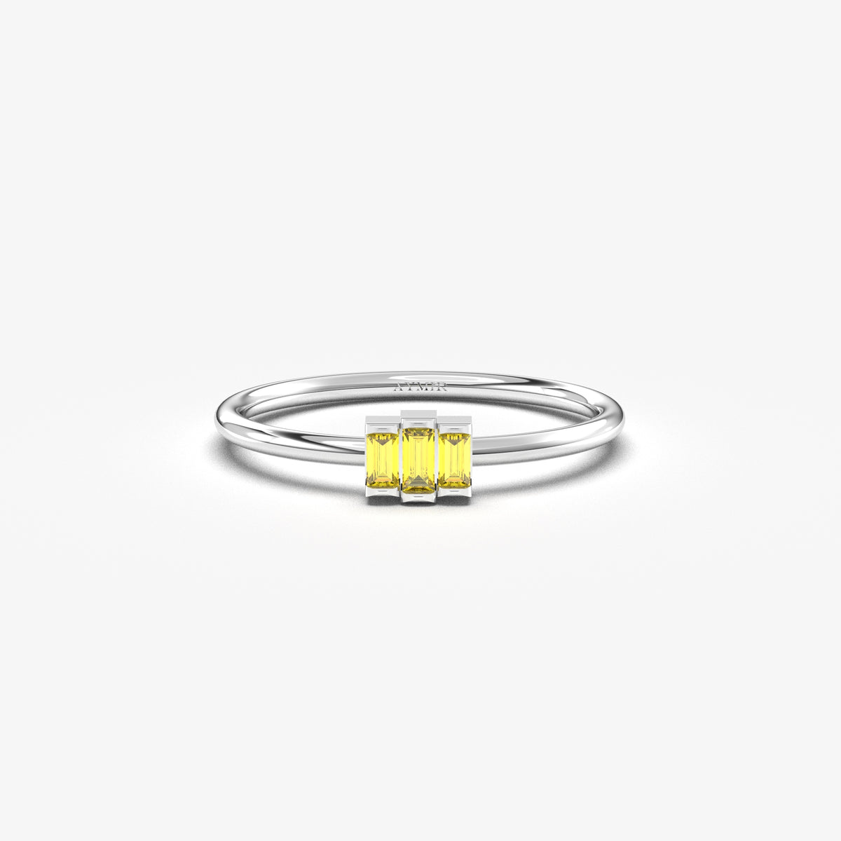 White gold yellow-stone three-baguette ring, front view