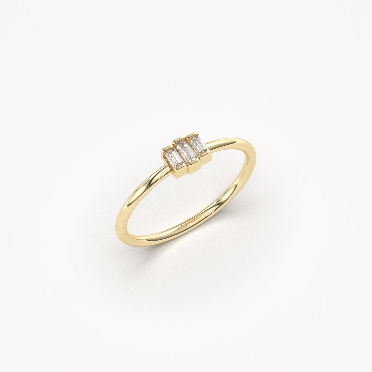 Yellow gold white-stone three-baguette ring, angled view