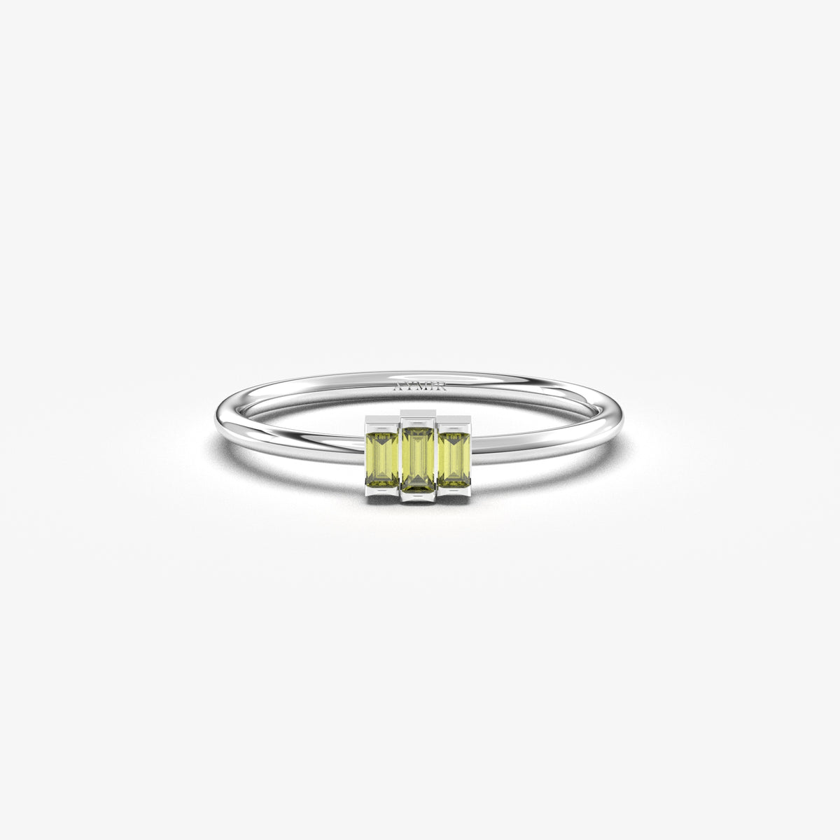 White gold green-stone three-baguette ring, front view
