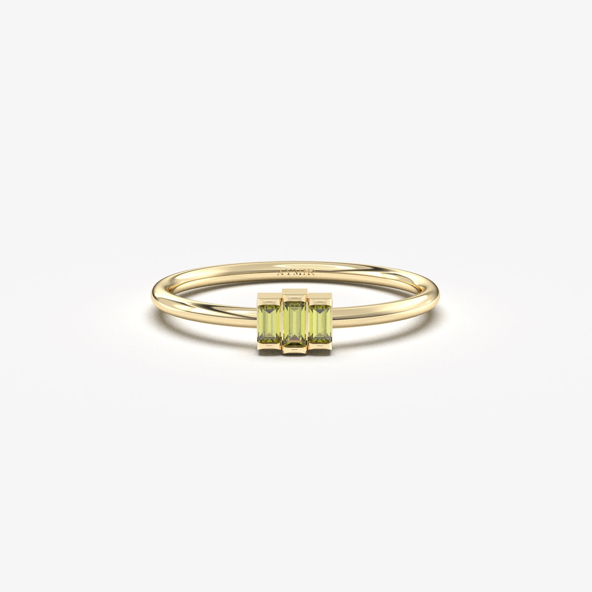 Yellow gold green-stone three-baguette ring, front view
