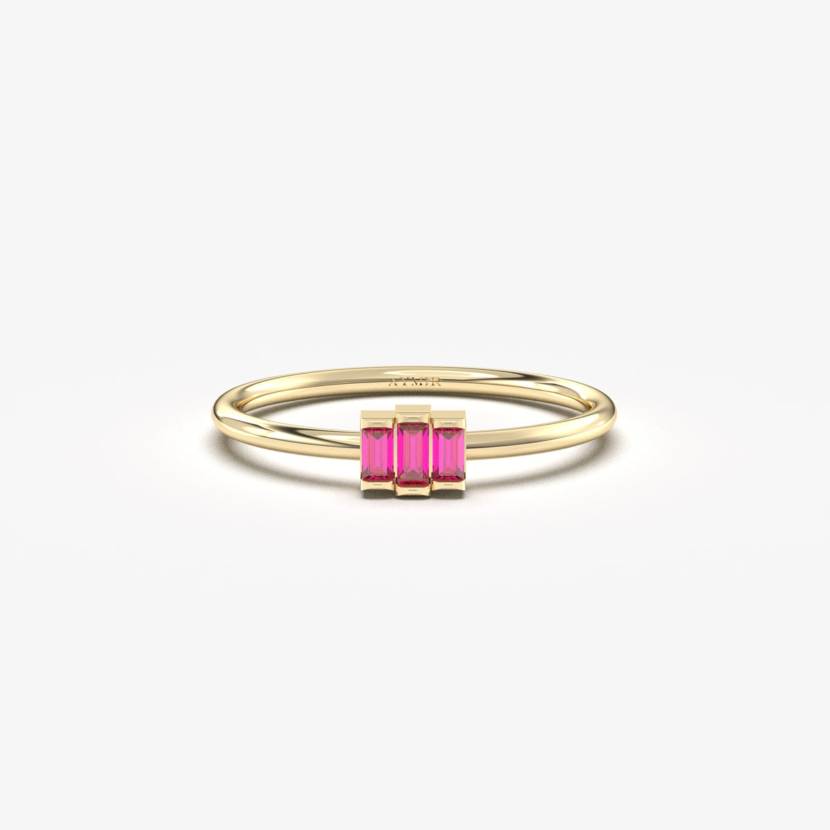 Yellow gold red-stone three-baguette ring, front view