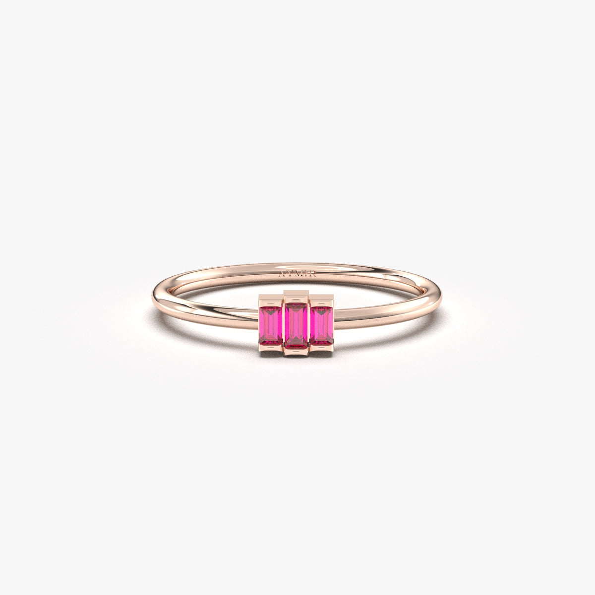 Rose gold red-stone three-baguette ring, front view