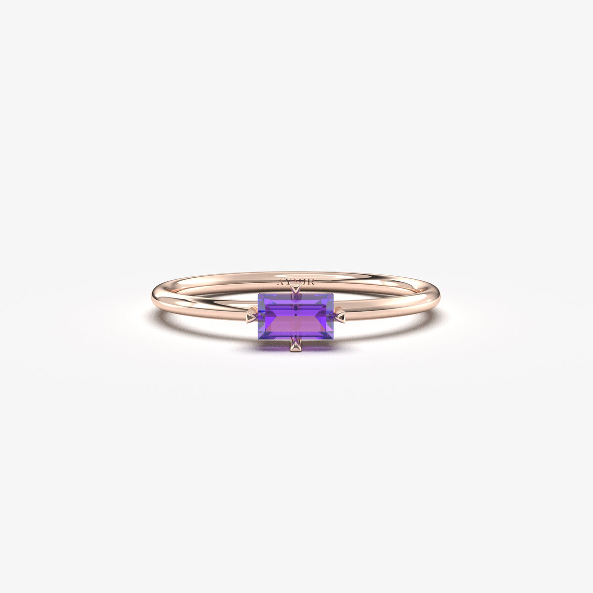 Rose gold purple-stone baguette solitaire ring, front view