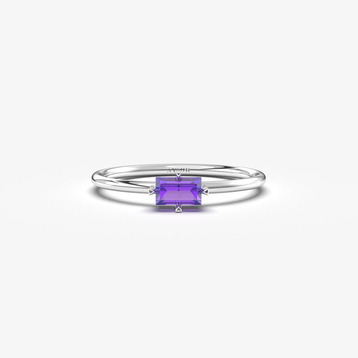 White gold purple-stone baguette solitaire ring, front view