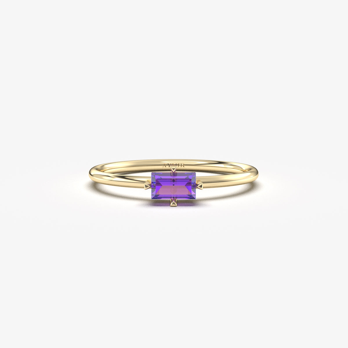 Yellow gold purple-stone baguette solitaire ring, front view