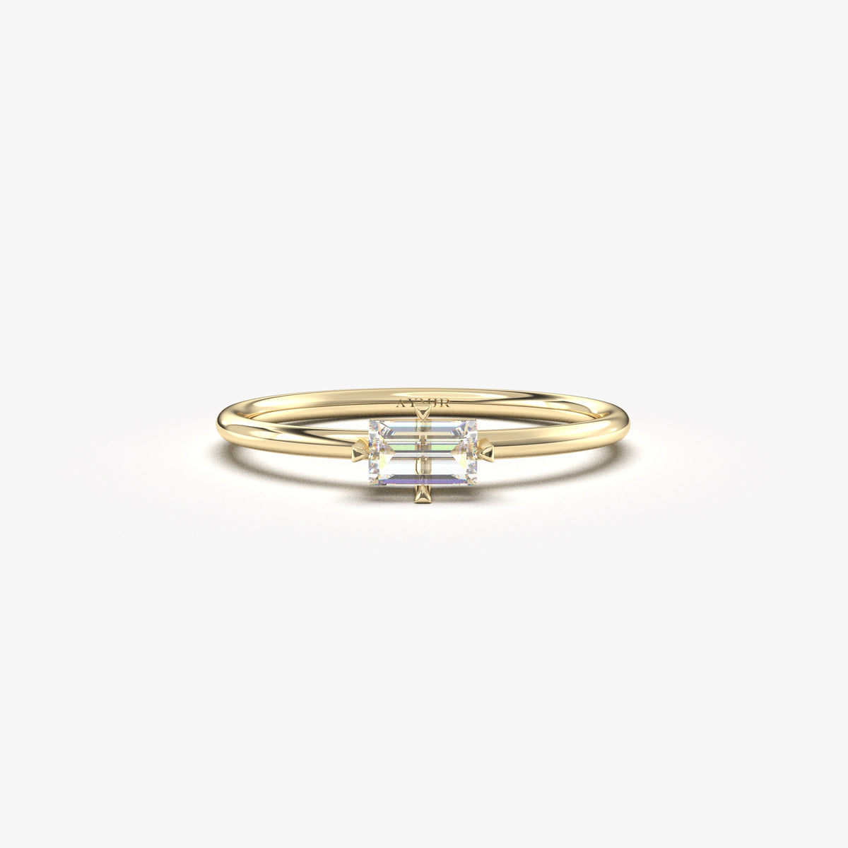 Yellow gold white-stone baguette solitaire ring, front view