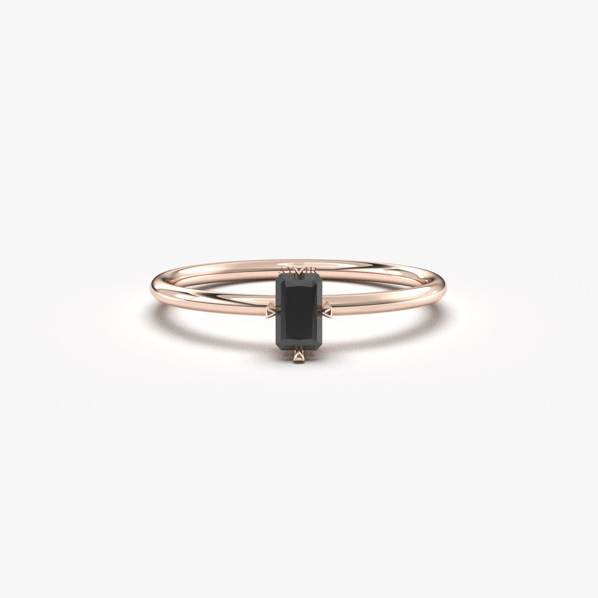 Rose gold black onyx baguette solitaire ring, front view