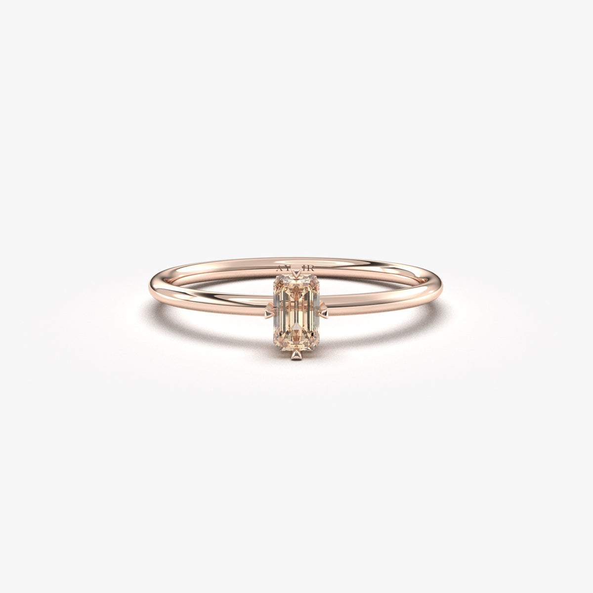 Rose gold champagne-stone baguette solitaire ring, front view