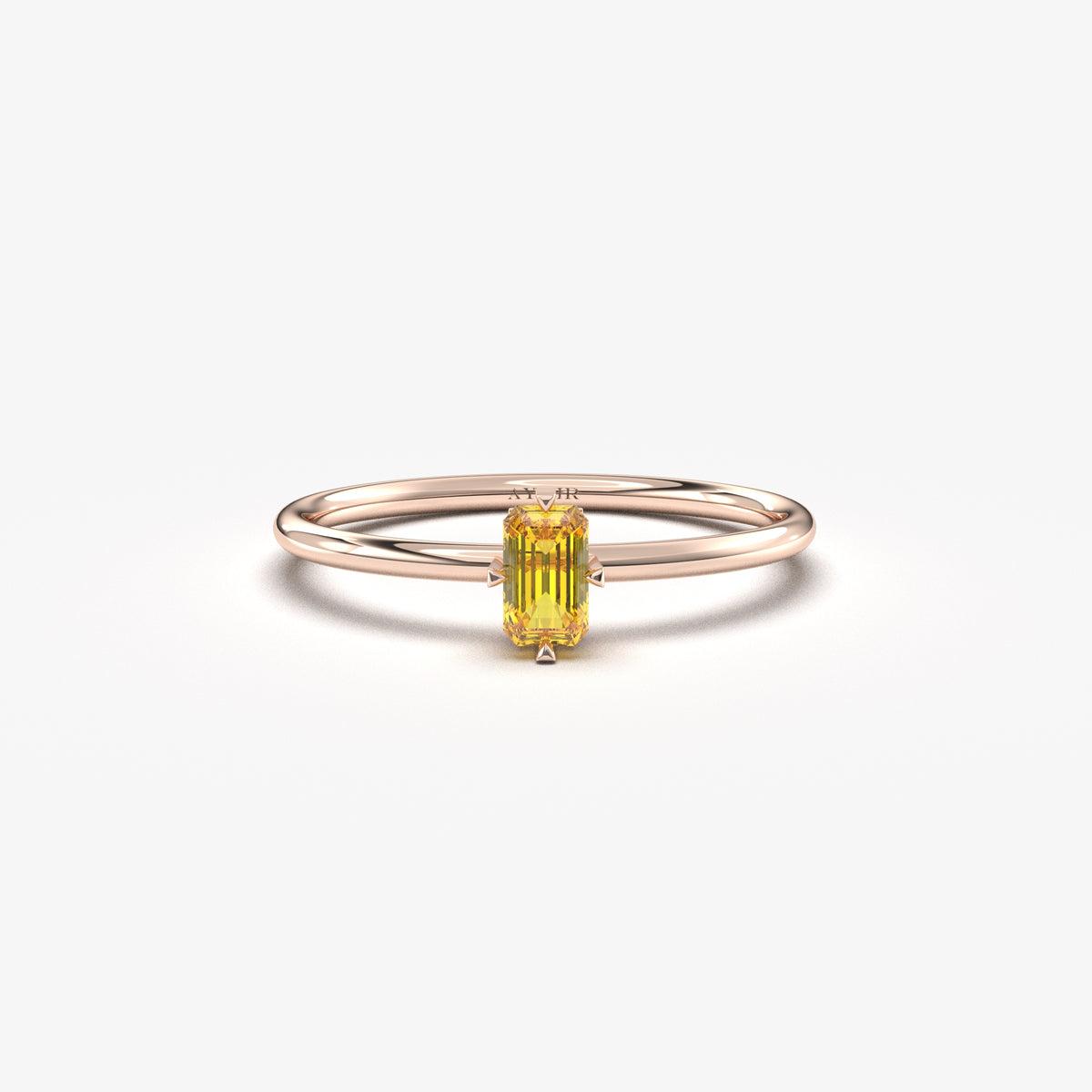 Rose gold yellow-stone baguette solitaire ring, front view