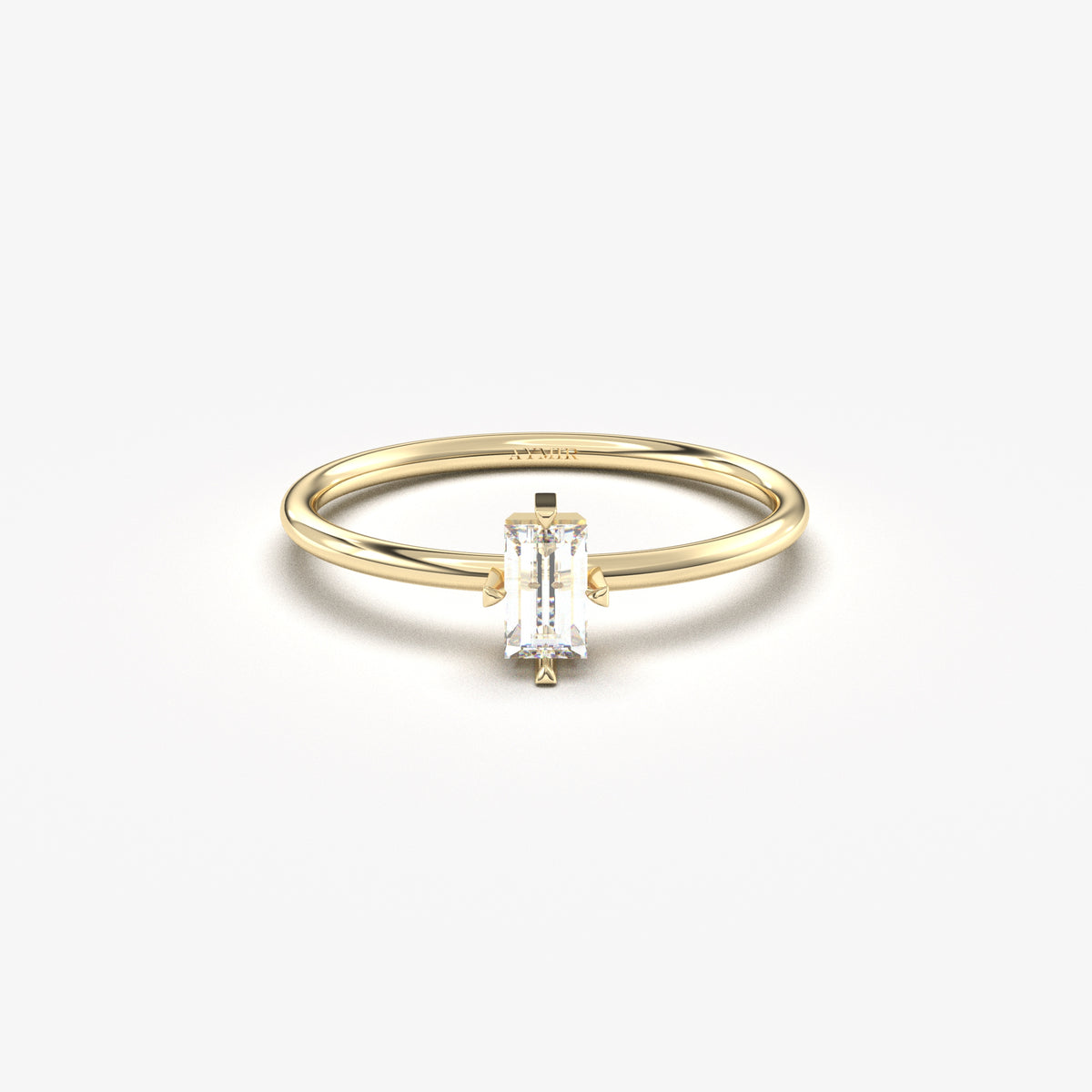 Yellow gold white-stone baguette solitaire ring, front view