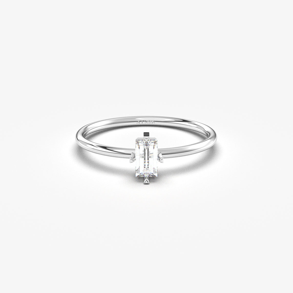 White gold white-stone baguette solitaire ring, front view