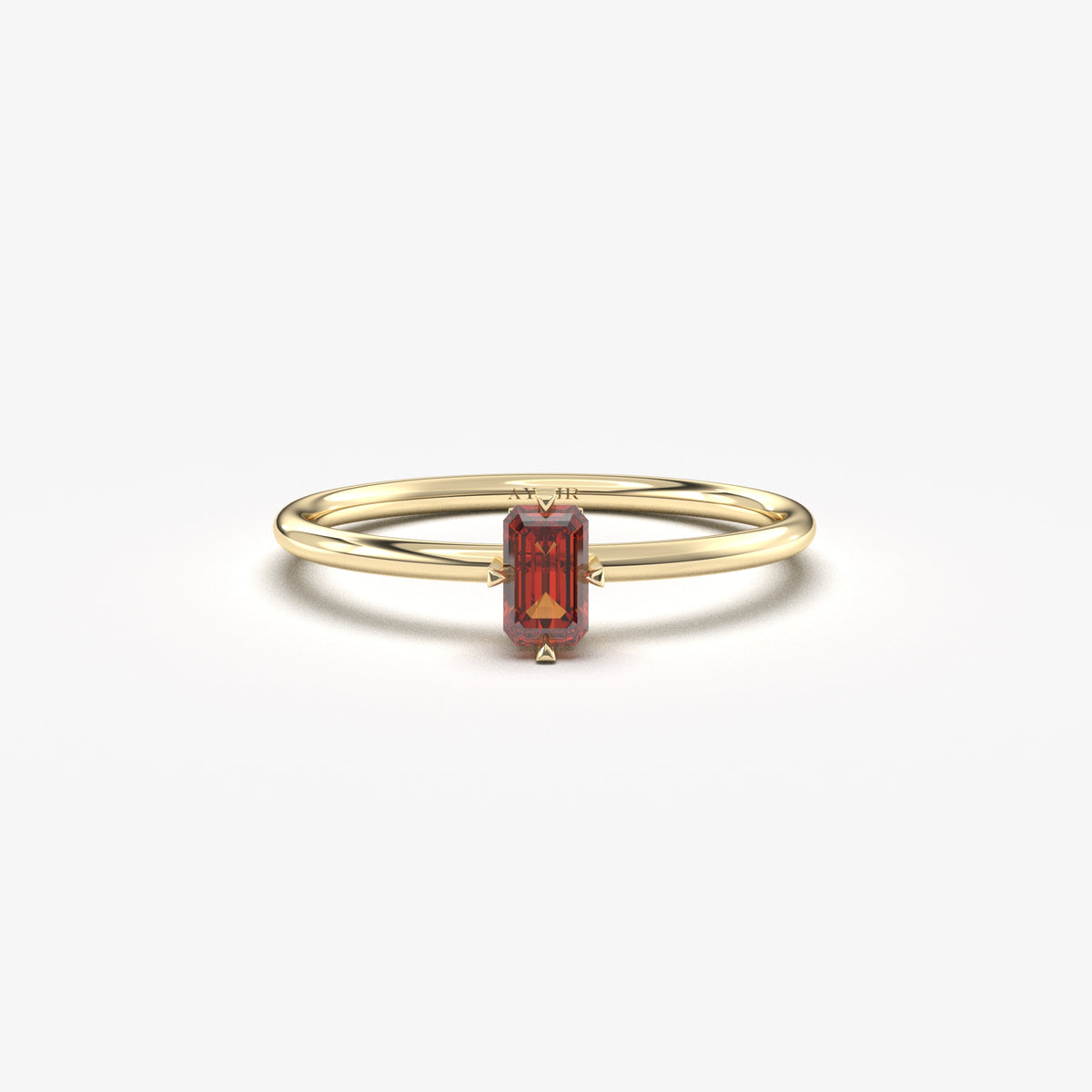 Yellow gold dark-red-stone baguette solitaire ring, front view