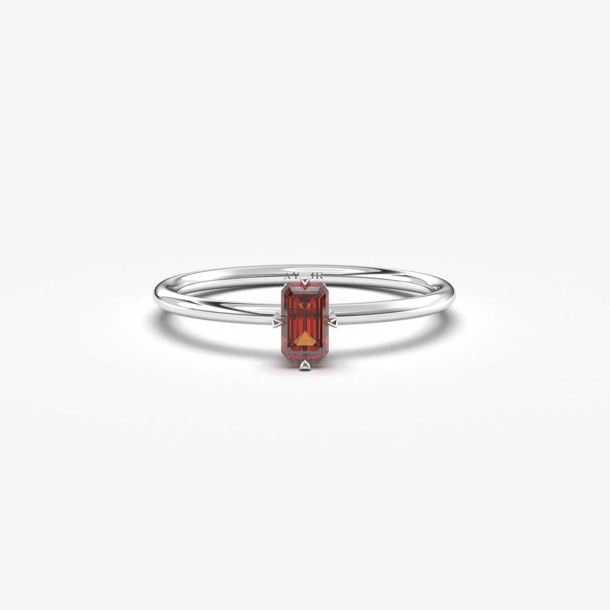 White gold dark-red-stone baguette solitaire ring, front view