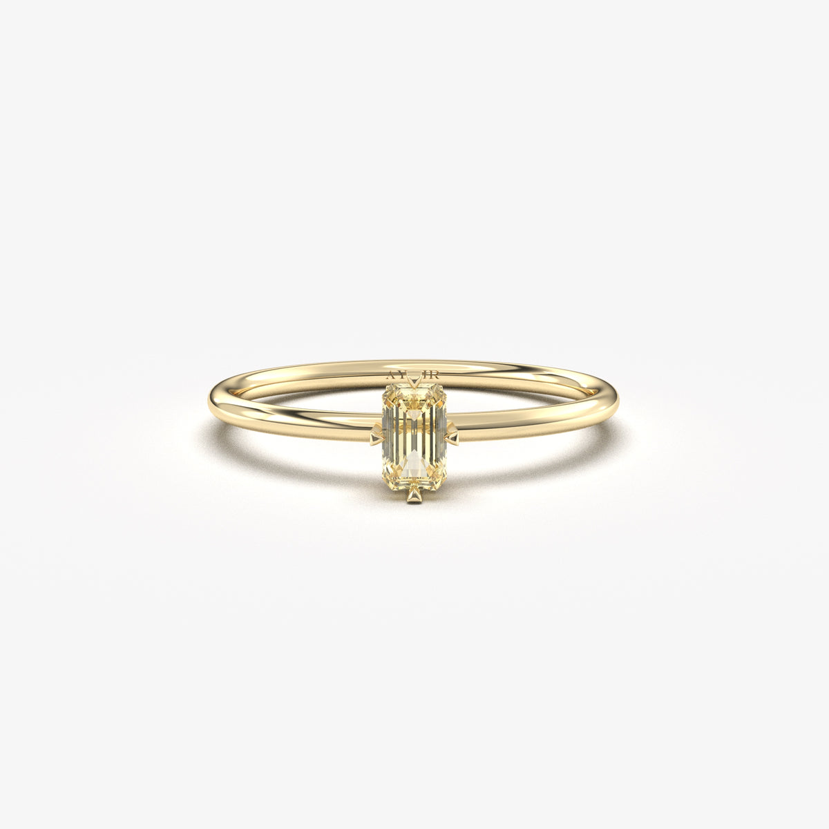 Yellow gold lemon-yellow-stone baguette solitaire ring, front view