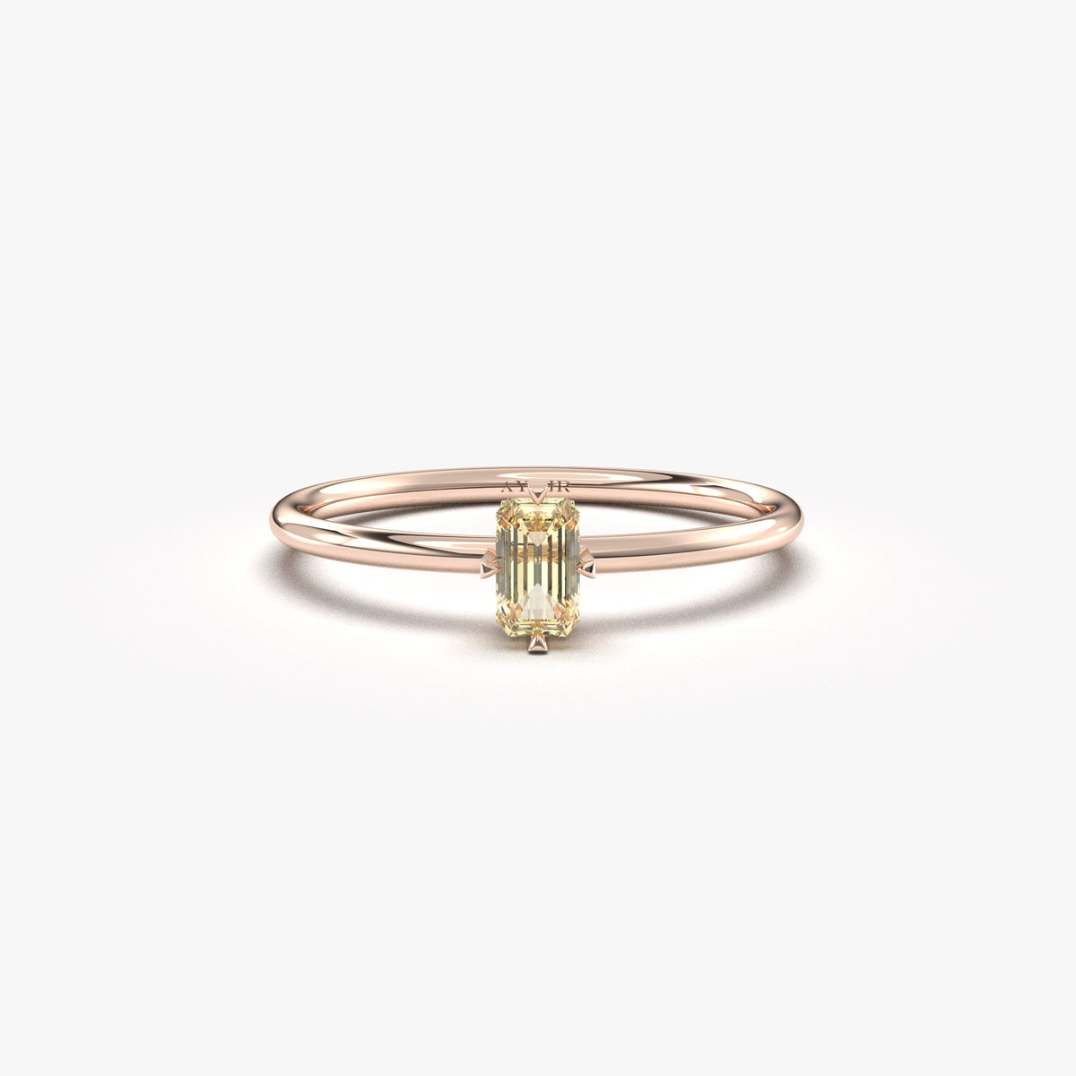 Rose gold lemon-yellow-stone baguette solitaire ring, front view