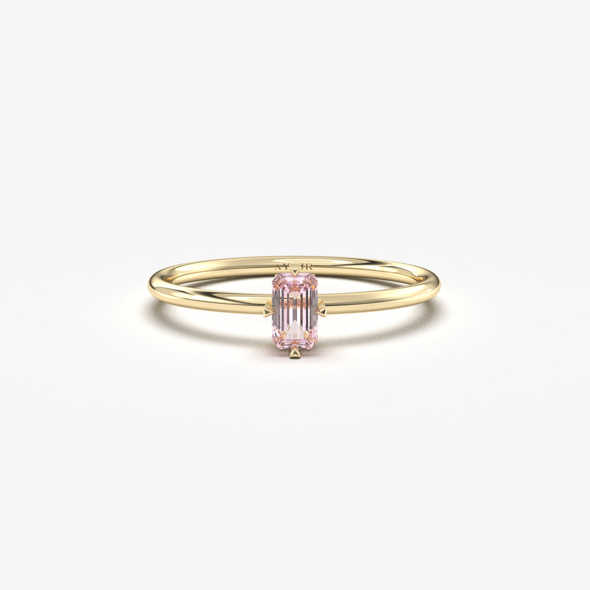 Yellow gold pink-stone baguette solitaire ring, front view