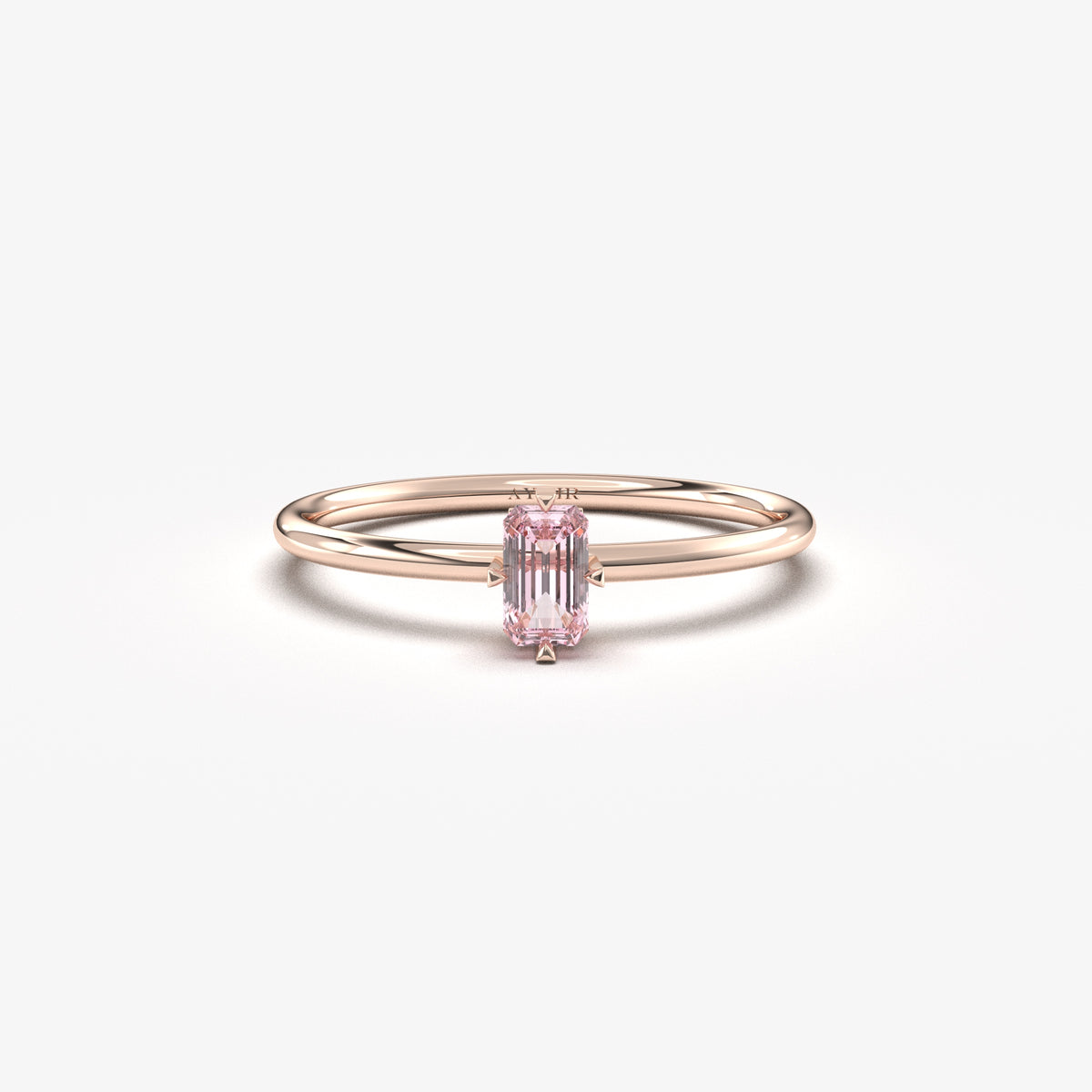 Rose gold pink-stone baguette solitaire ring, front view