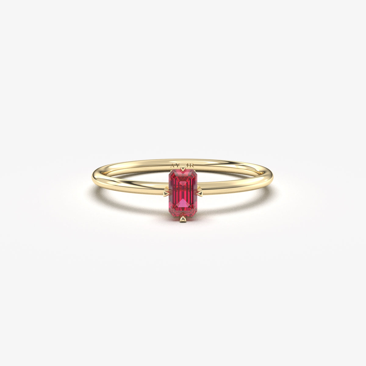 Yellow gold red-stone baguette solitaire ring, front view