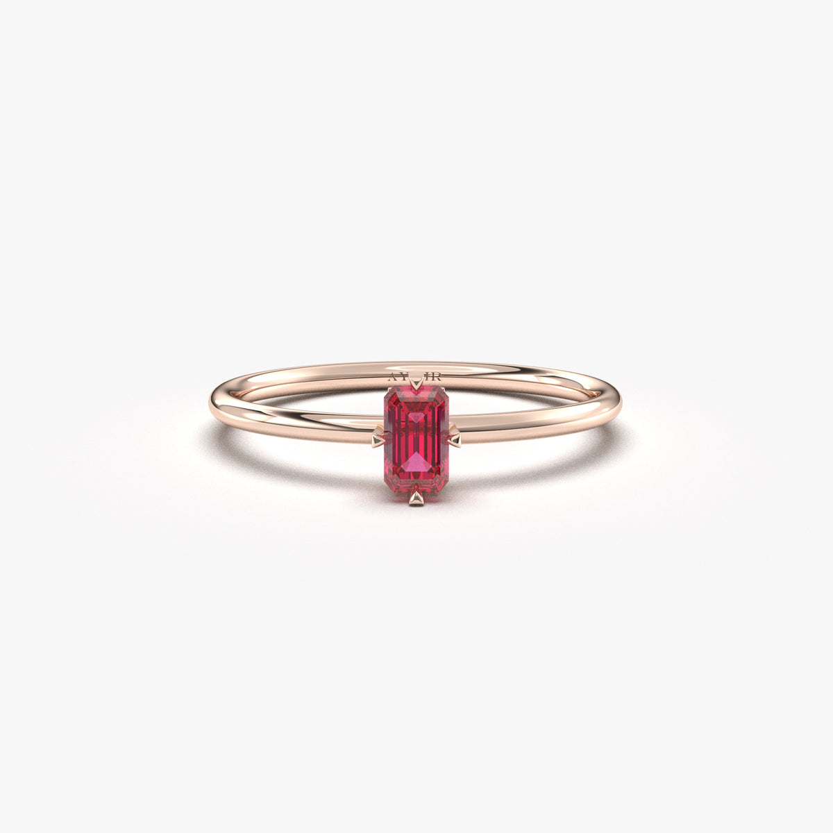 Rose gold red-stone baguette solitaire ring, front view