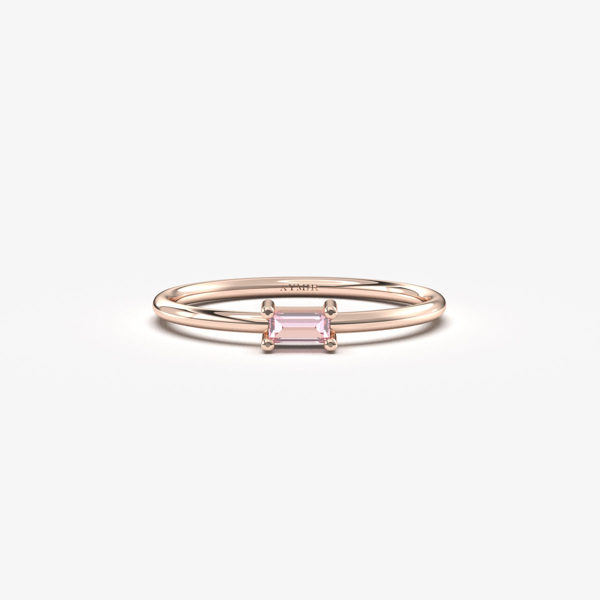 Rose gold pink-stone baguette solitaire ring, front view