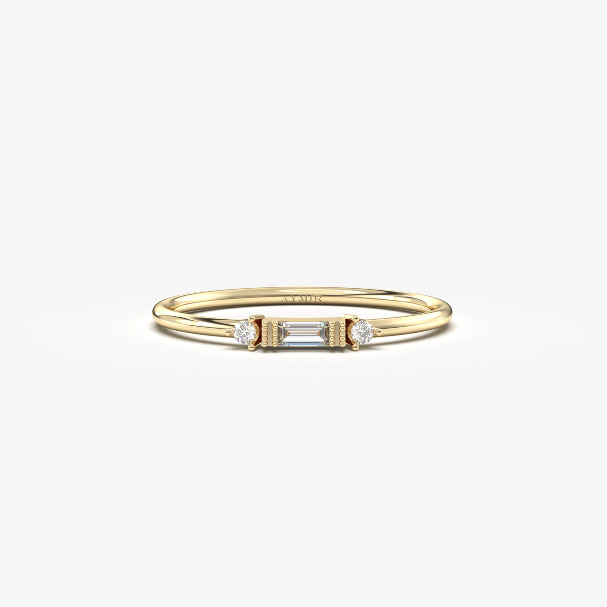 Yellow gold bezel baguette ring, front view