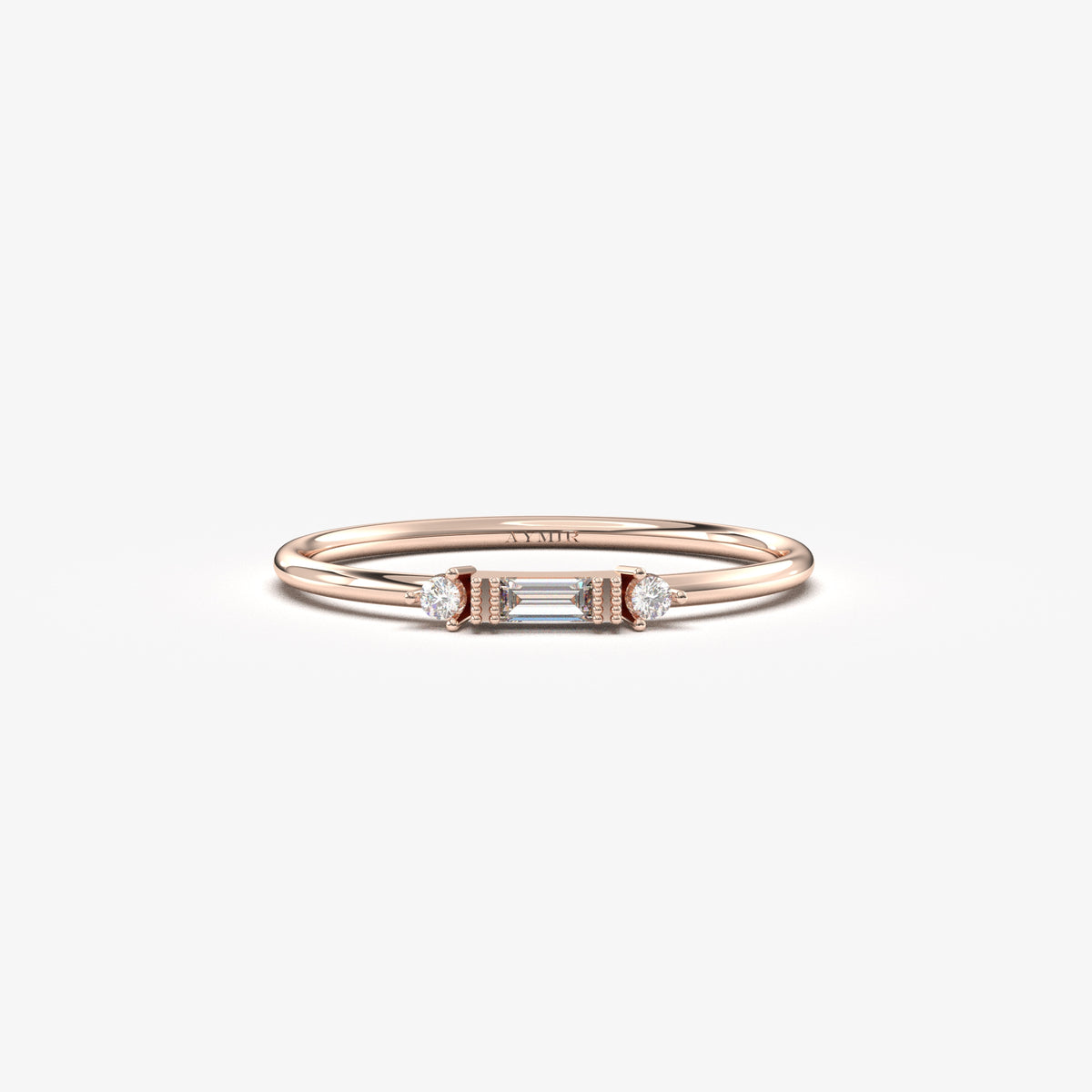 Rose gold bezel baguette ring, front view