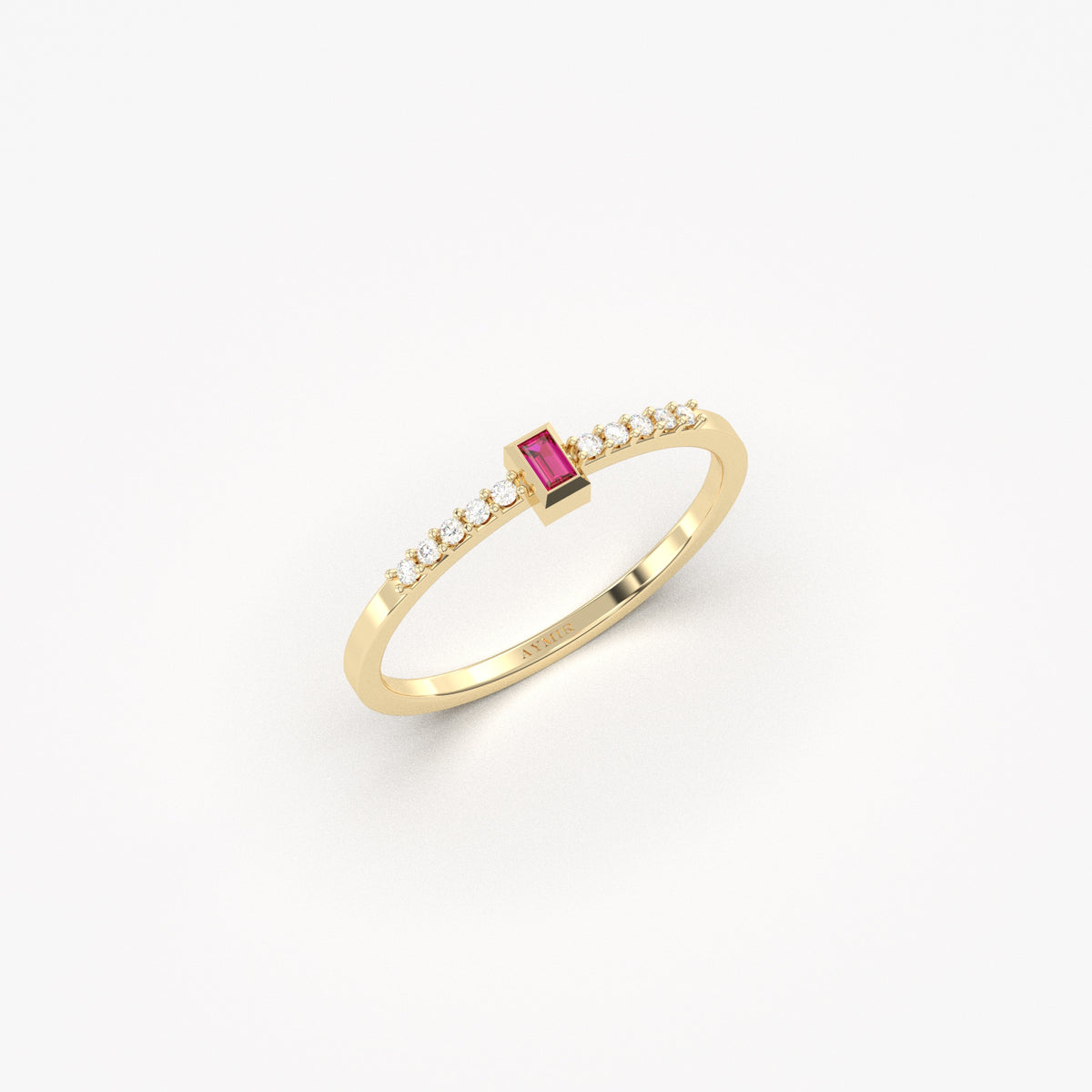 Yellow gold red-stone baguette ring, angled view