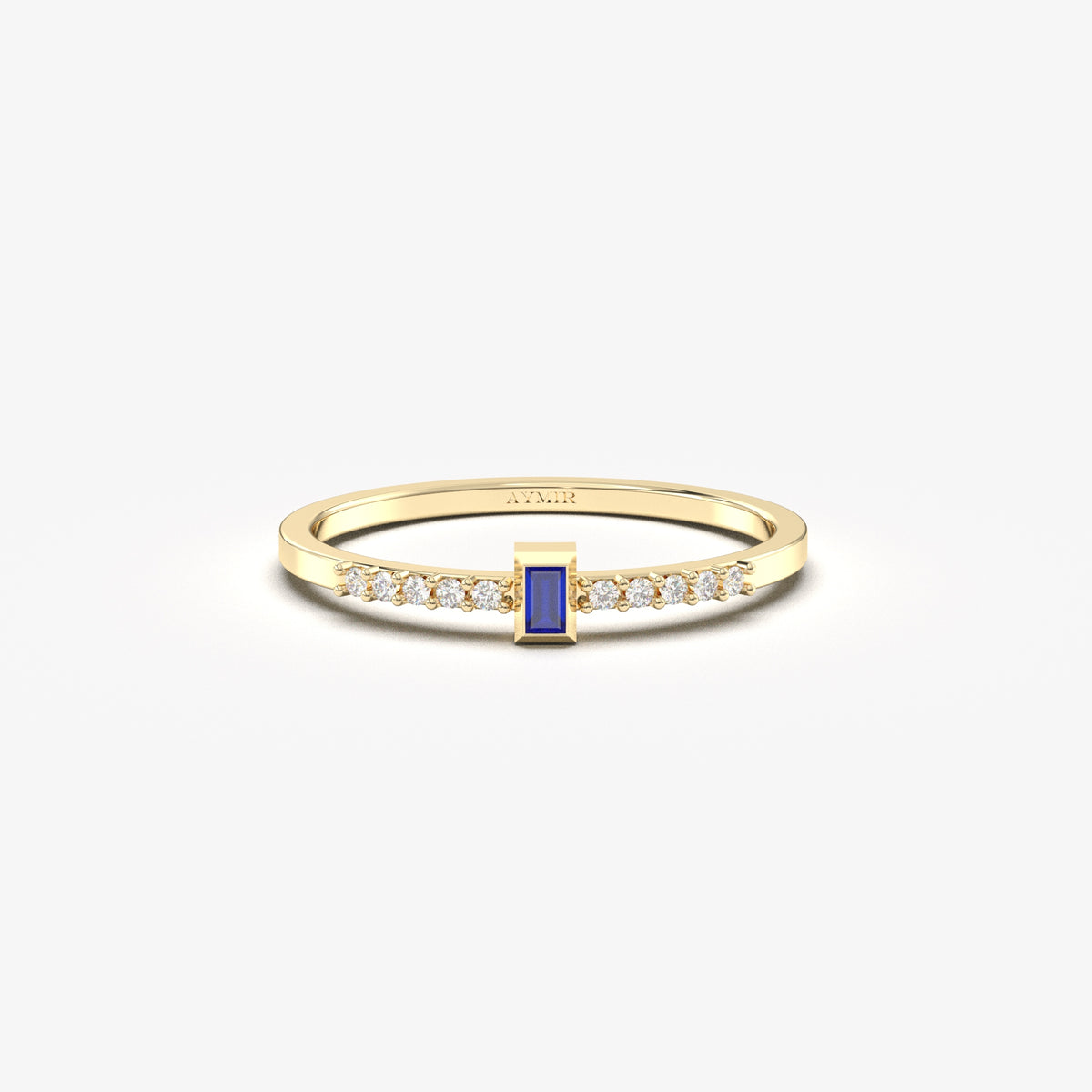 Yellow gold blue-stone baguette ring, front view