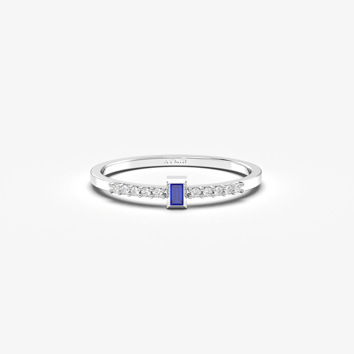White gold blue-stone baguette ring, front view