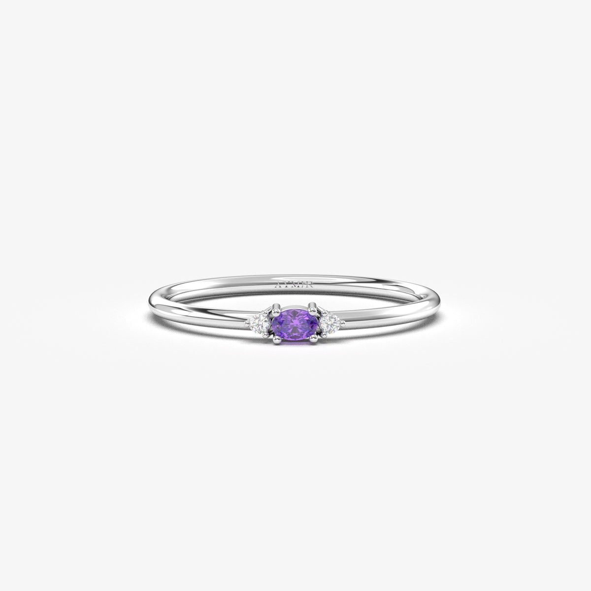 White gold purple-stone three-stone oval ring, front view