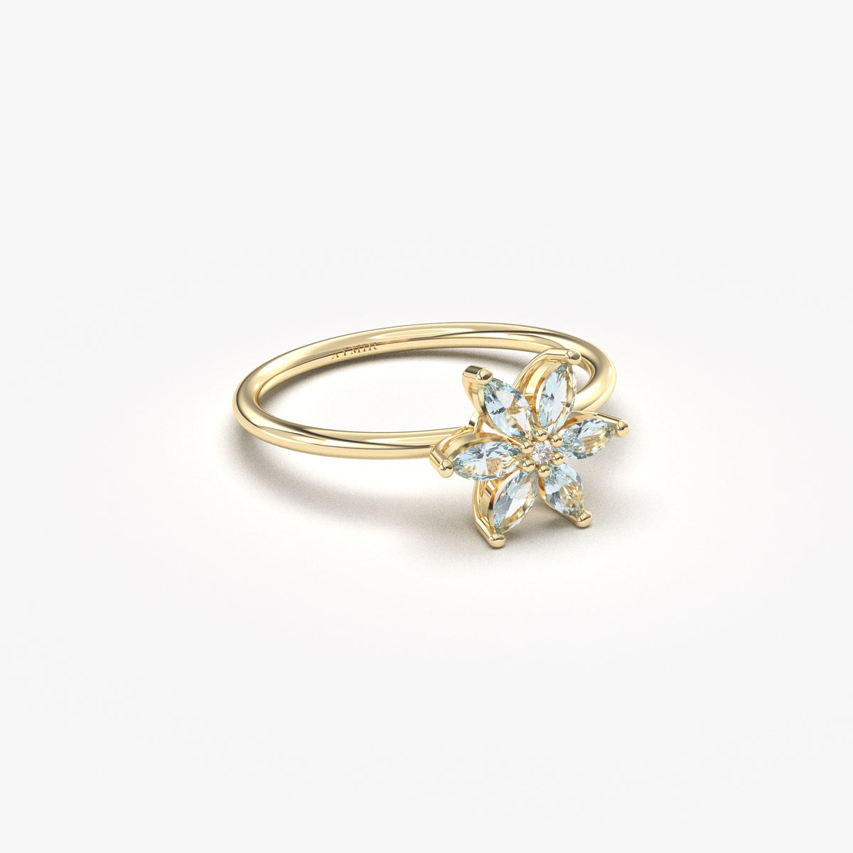 Yellow gold aqua-blue-stone marquise flower ring, angled view