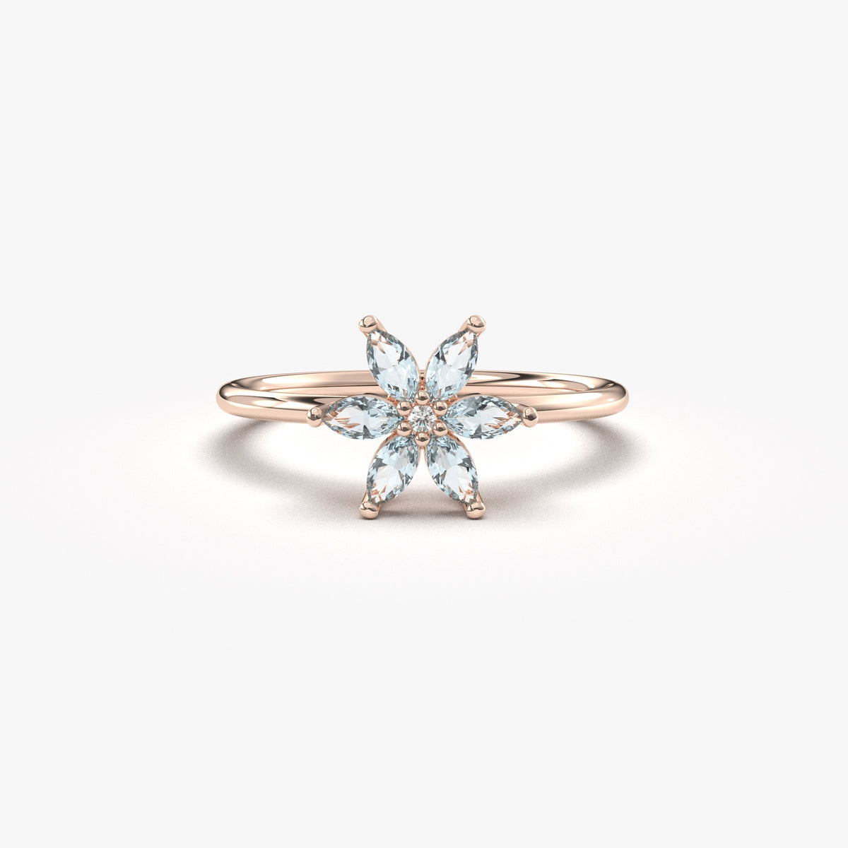 Rose gold aqua-blue-stone marquise flower ring, front view