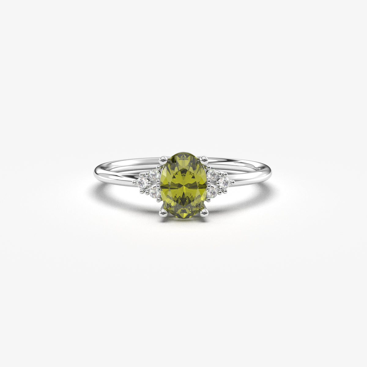 White gold green-stone oval ring, front view