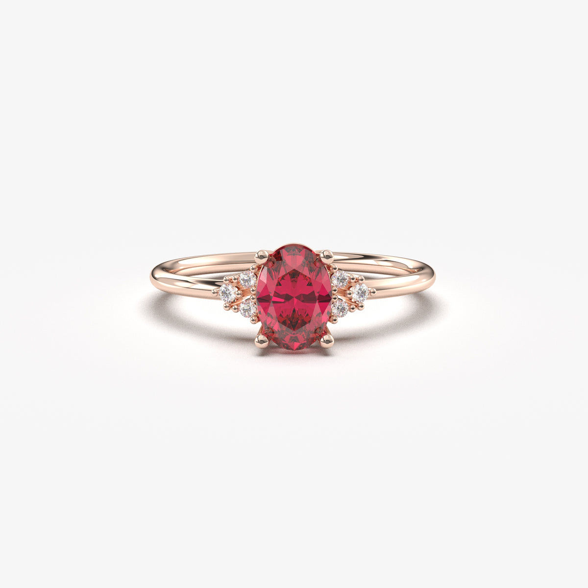 Rose gold red-stone oval ring, front view