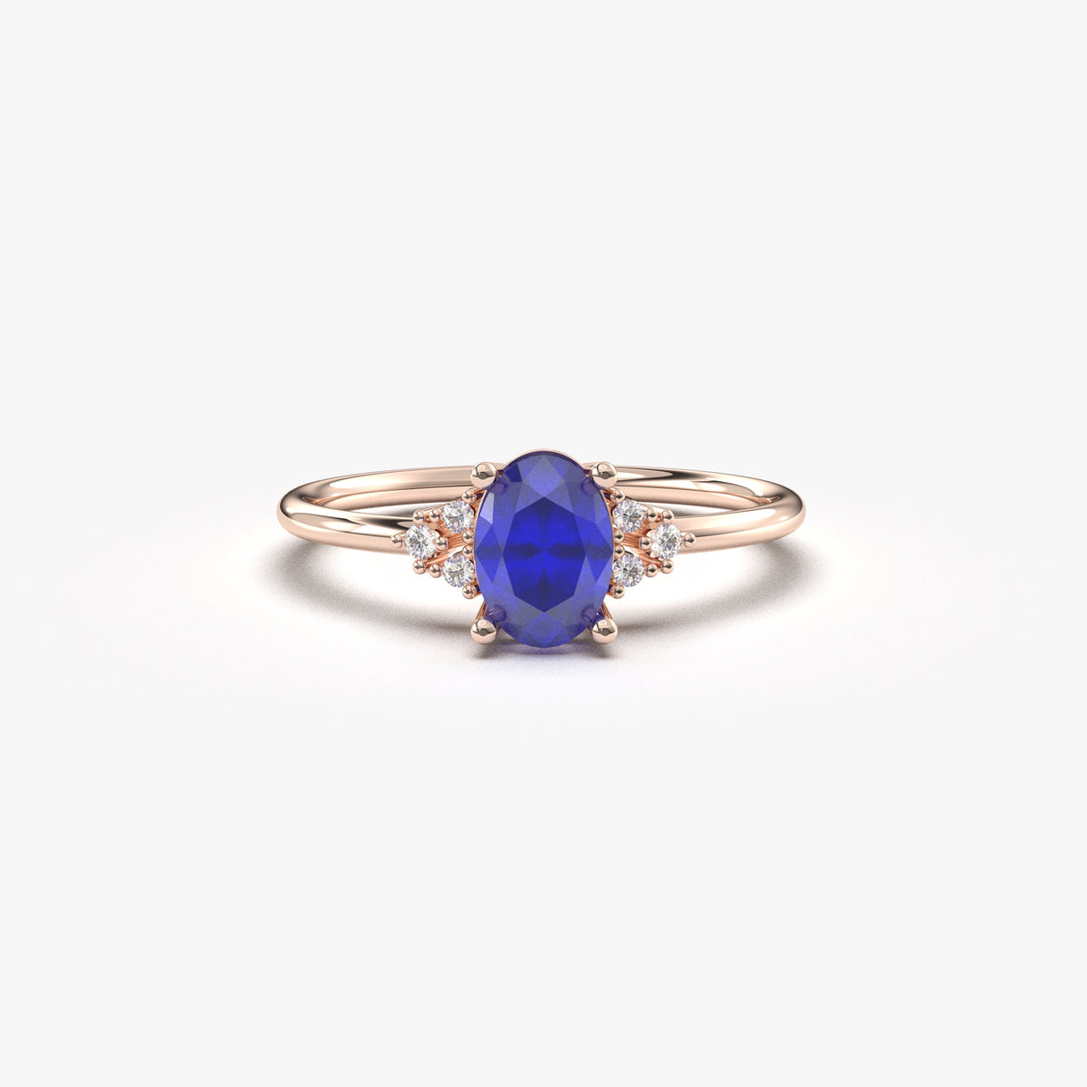 Rose gold blue-stone oval ring, front view