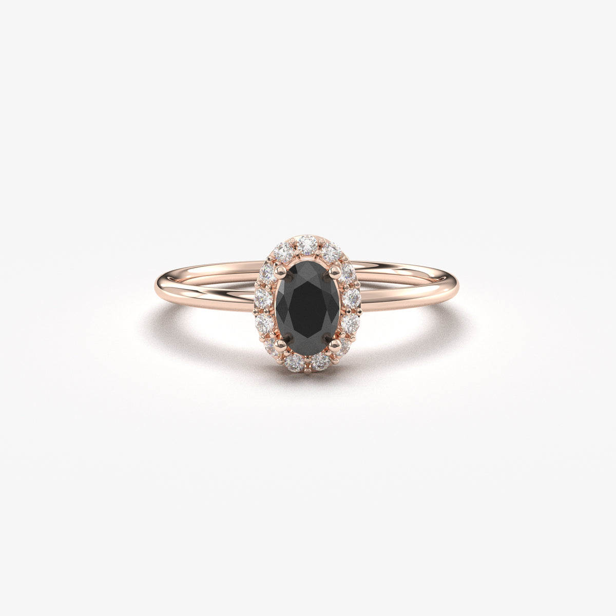 Rose gold black-stone oval halo ring, front view