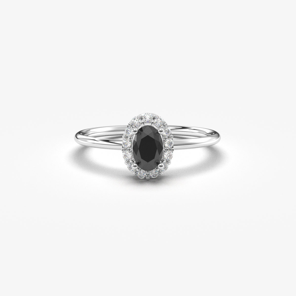 White gold black-stone oval halo ring, front view