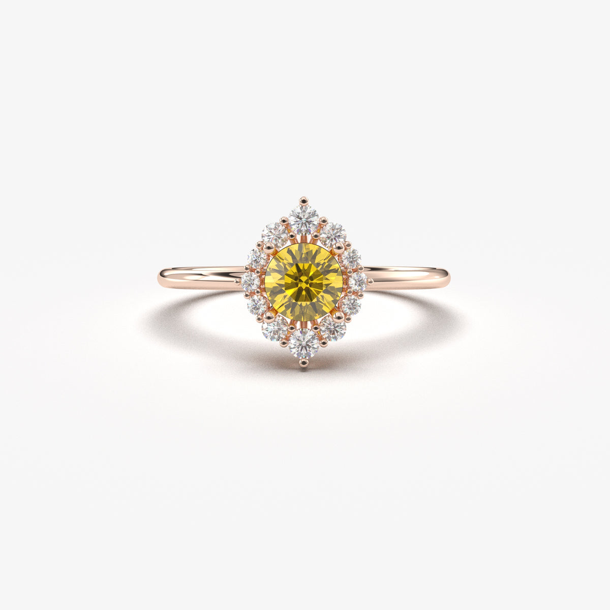 Rose gold yellow-stone round halo ring, front view