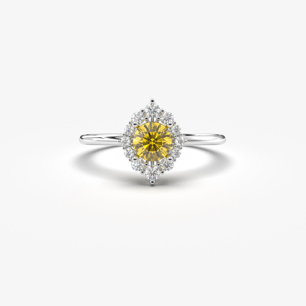 White gold yellow-stone round halo ring, front view