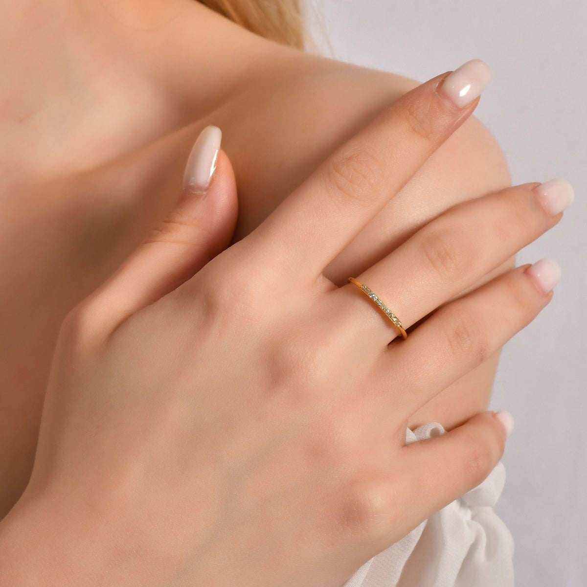 Gold bar stacking ring worn on hand