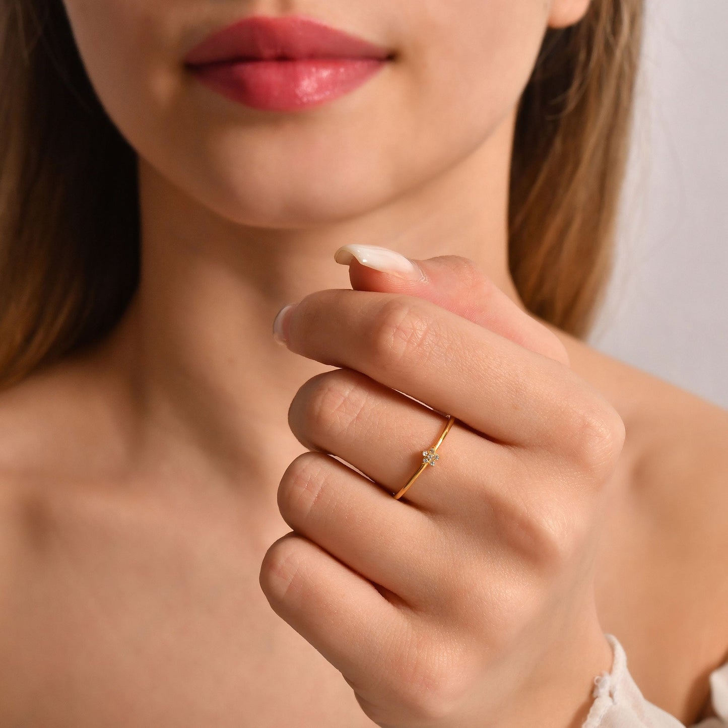 18K gold mini star diamond ring worn on hand